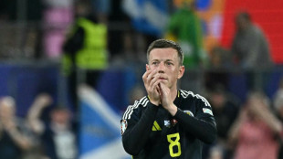 Celtic captain McGregor retires from Scotland duty