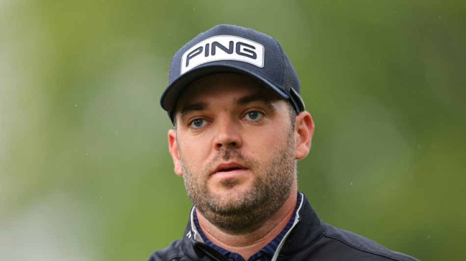 Conners grinds to PGA lead as Rose charges at rainy Oak Hill