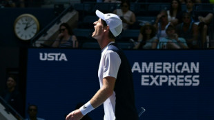 Murray slides to heavy US Open defeat against Dimitrov