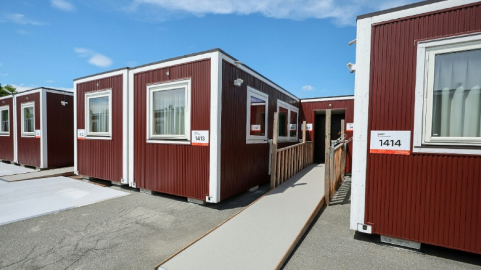 IOC president impressed by 'beautiful' Asian Games wooden huts