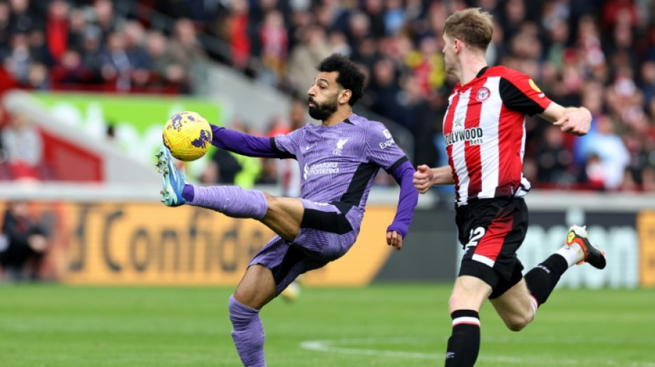 Salah scores in Liverpool return as Arsenal keep pressure on leaders