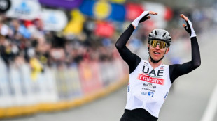 Monumental Pogacar escapes to Tour of Flanders triumph