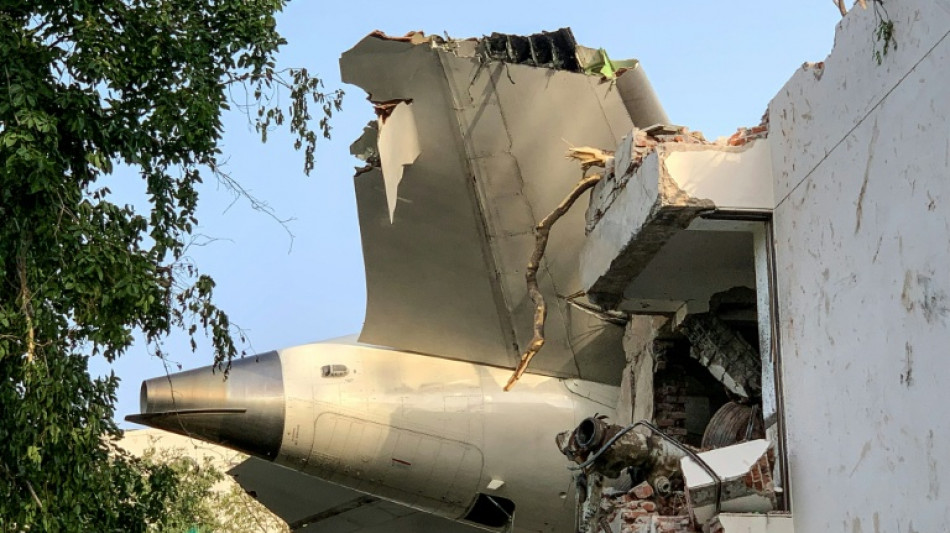 Rescue teams comb site of Air India crash that killed at least 265
