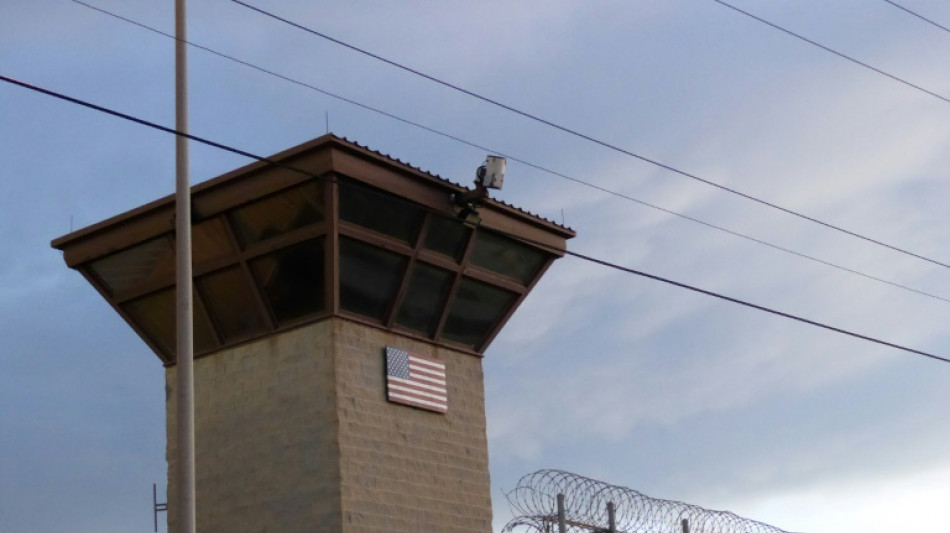 US flights carrying detained migrants to Guantanamo 'underway'