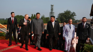 Kim, Poutine et Xi assistent ensemble à un défilé en forme de défi à l'Occident
