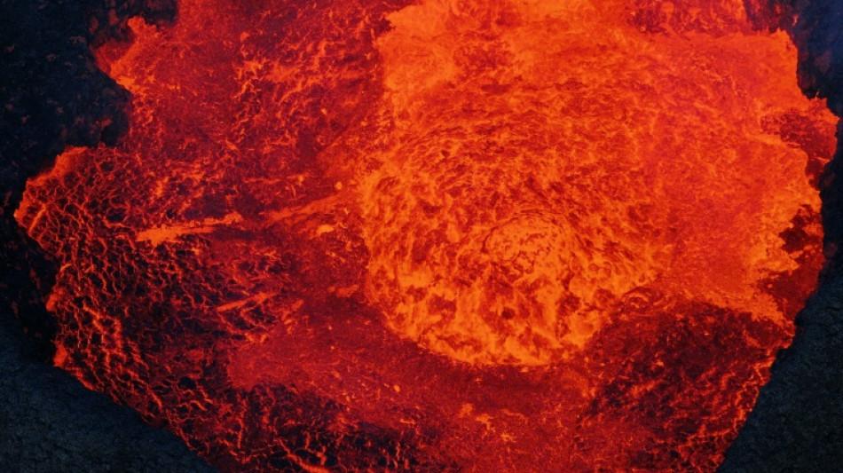 Iceland volcano still spewing lava, one month on