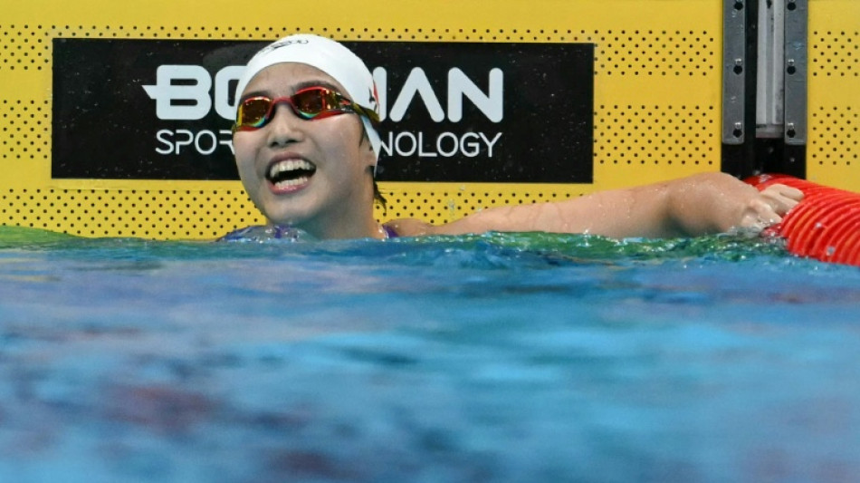 Swimming prodigy Yu, 13, says 'interviews way harder than racing'