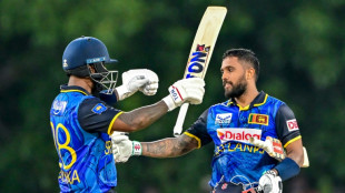Record stand propels Sri Lanka to 324-5 against New Zealand