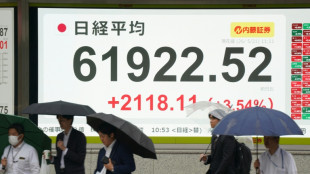 Asian stocks surge on Iran hopes, Samsung union talks