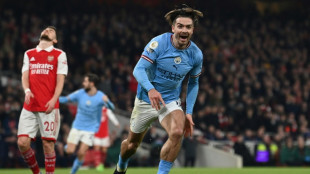 Man City sink Arsenal to seize top spot in title race