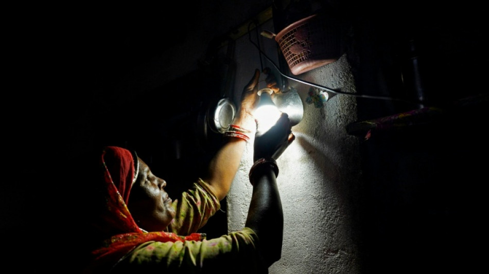 In India's mining belt, women spark hope with solar lamps