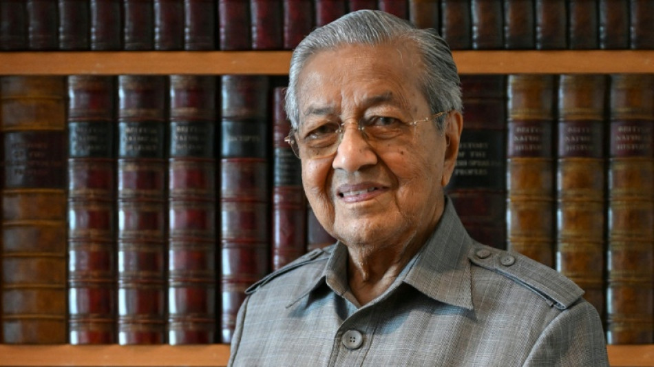 Malaysia's ex-PM Mahathir hospitalised with hip fracture after fall at home