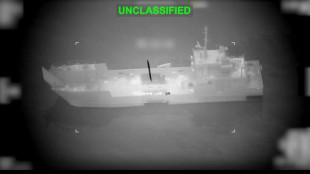 Trade ships hit as Iran threatens Gulf oil chokepoint