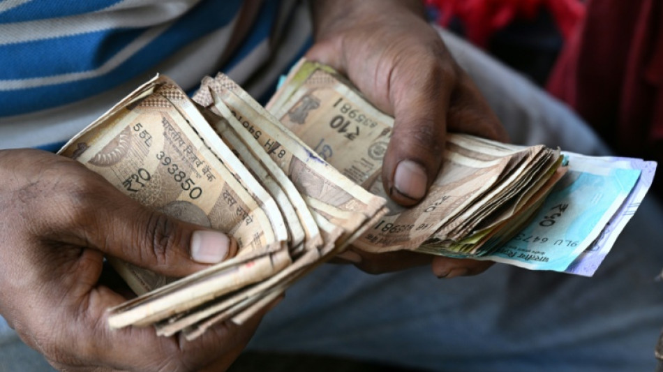 Indian rupee hits fresh record low past 90 per dollar