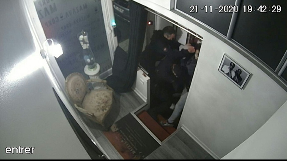 Paris officers accused of beating black producer to stand trial in November