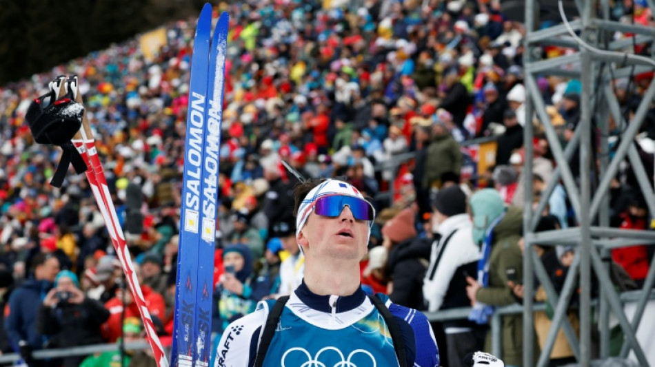 JO: le biathl&egrave;te &Eacute;ric Perrot m&eacute;daill&eacute; d'argent sur l'individuel, derri&egrave;re le Norv&eacute;gien Johan-Olav Botn