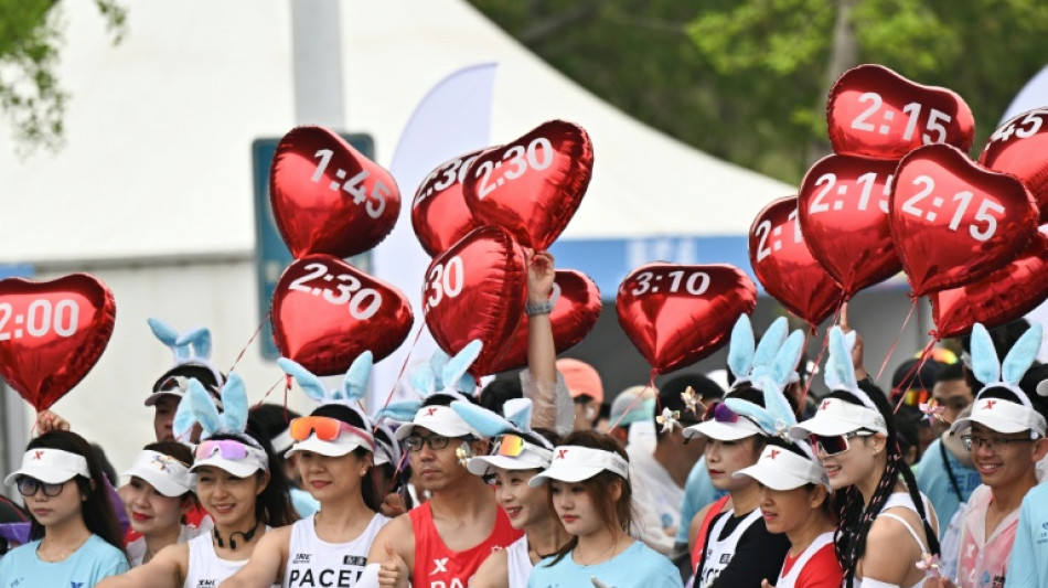 China bans runner after mid-marathon splits goes viral
