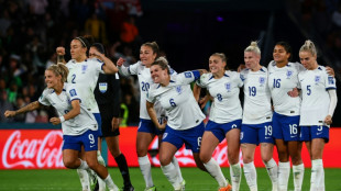 Ten-player England scrape through as Nigeria pay World Cup penalty