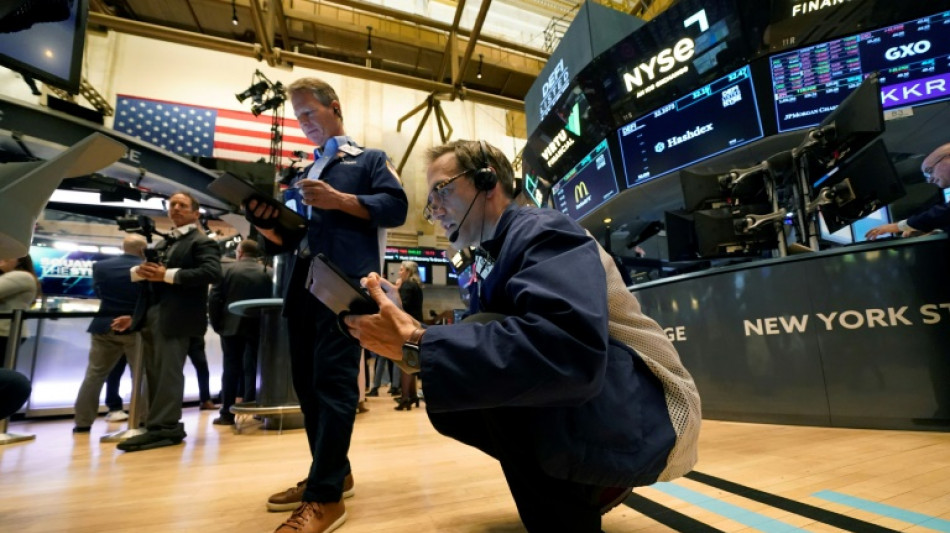 Wall Street ouvre en hausse, dig&eacute;rant la Fed