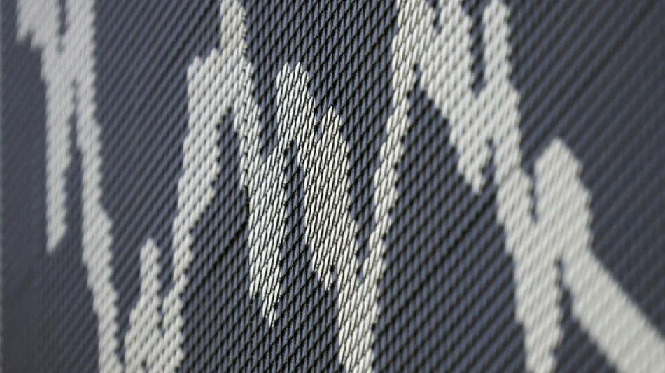 Stocks mark time with eyes on key economic data