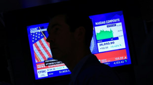 Wall Street cl&ocirc;ture en nette hausse, salue le ton de la Fed