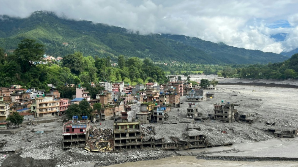Nepali families hold symbolic funerals for missing after floods