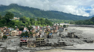 Nepali families hold symbolic funerals for missing after floods