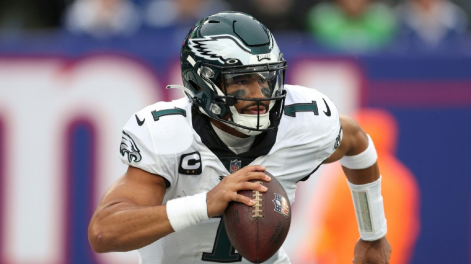 NFL-best Eagles grab playoff spot while Lions upset Vikings