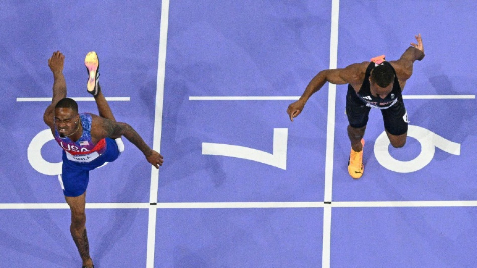 Quincy Hall shows sheer grit to win Olympic 400m title